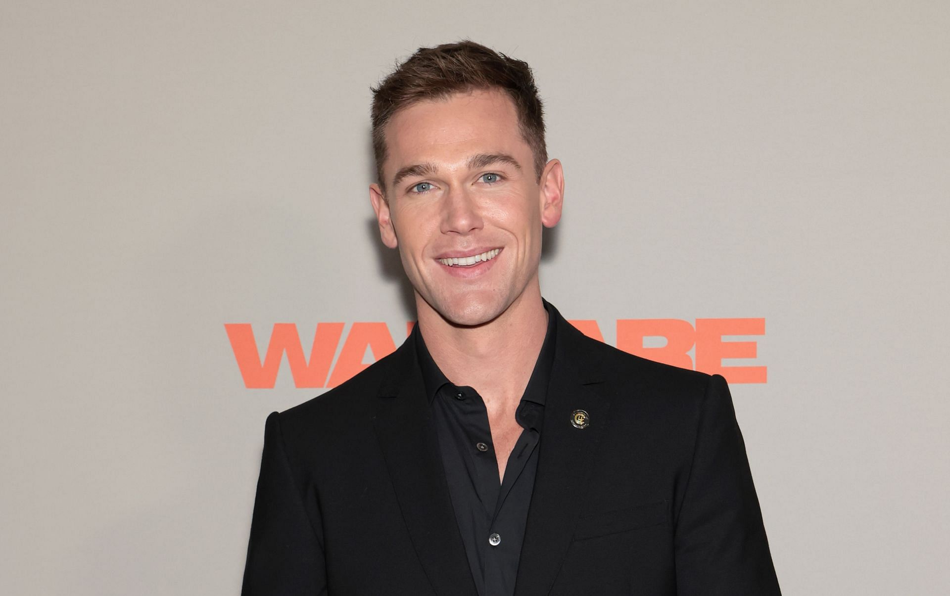 Taylor John Smith attends the Los Angeles premiere of A24's "Warfare" at DGA Theater Complex on March 27, 2025, in Los Angeles, California. (Image via Getty)